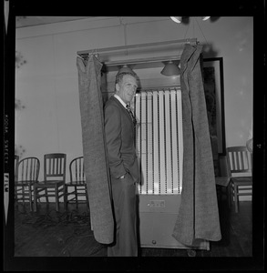 Mayor Kevin White in the voting booth