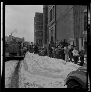 Group of students and teachers evacuating Abraham Lincoln School during a basement fire