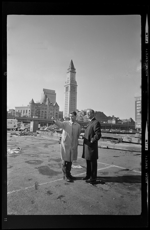 Mayor Kevin White with another man on the construction site at India Wharf