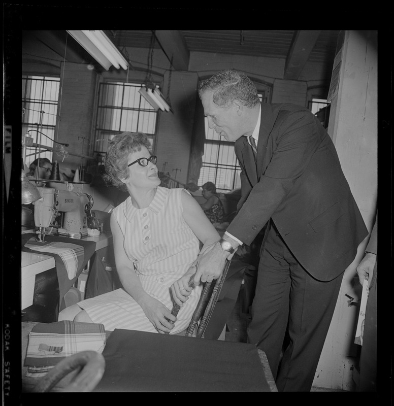 Mayoralty candidate Kevin White and Elizabeth Bordonaro of Jamaica Plain discuss politics during a visit by White to a Hub factory