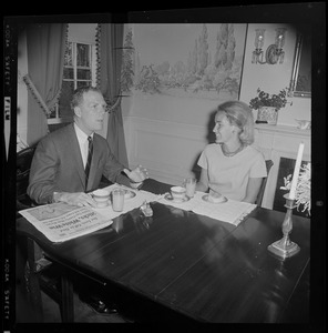 Kevin and Kathryn White seated at the dining table enjoying breakfast