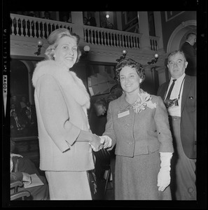 Margarita Bellotti, left, and Jennie Volpe, right, shaking hands