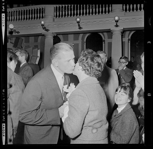 Former Gov. Volpe giving his wife, Jennie a kiss on her cheek