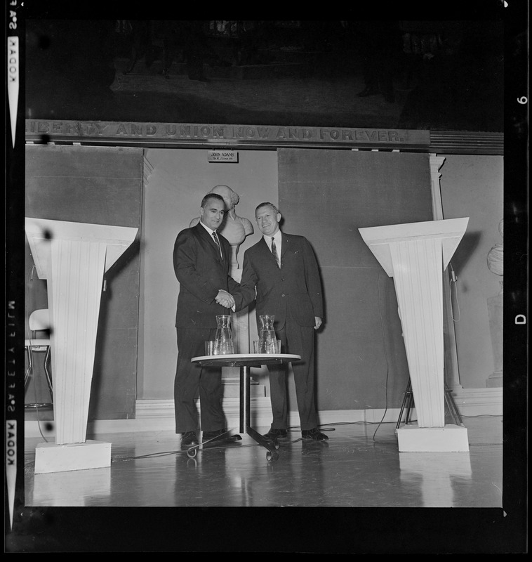 Lt. Gov. Francis X. Bellotti and former Gov. Volpe shaking hands either before or after the debate