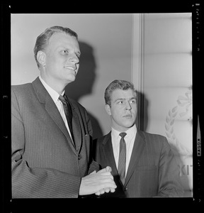 Evangelist Billy Graham, Hans Scherner, Chairman of Harvard's Mission's Committee greets guest