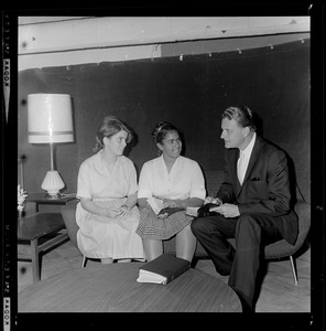 Evangelist Dr. Billy Graham meeting with two women