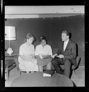 Evangelist Dr. Billy Graham meeting with two women