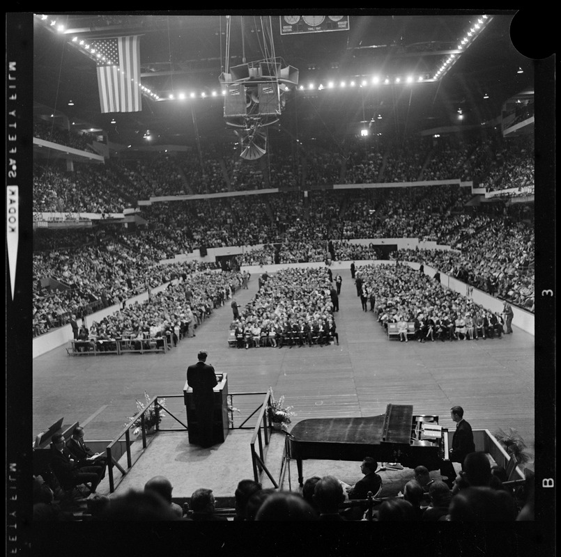 View of the crowd during evangelist Dr. Billy Graham's sermon, from the backside of the stage