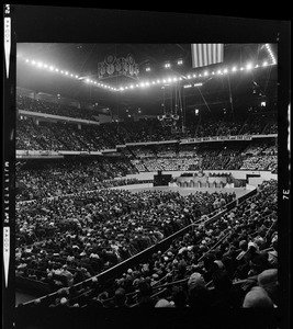 View of the crowd looking towards the stage during evangelist Dr. Billy Graham's sermon