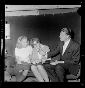 Evangelist Dr. Billy Graham meeting with two women