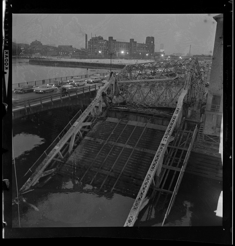 The Old Alford St. bridge linking Charlestown and Everett collapsed with a shattering roar of grinding steel and concrete into the Mystic River yesterday