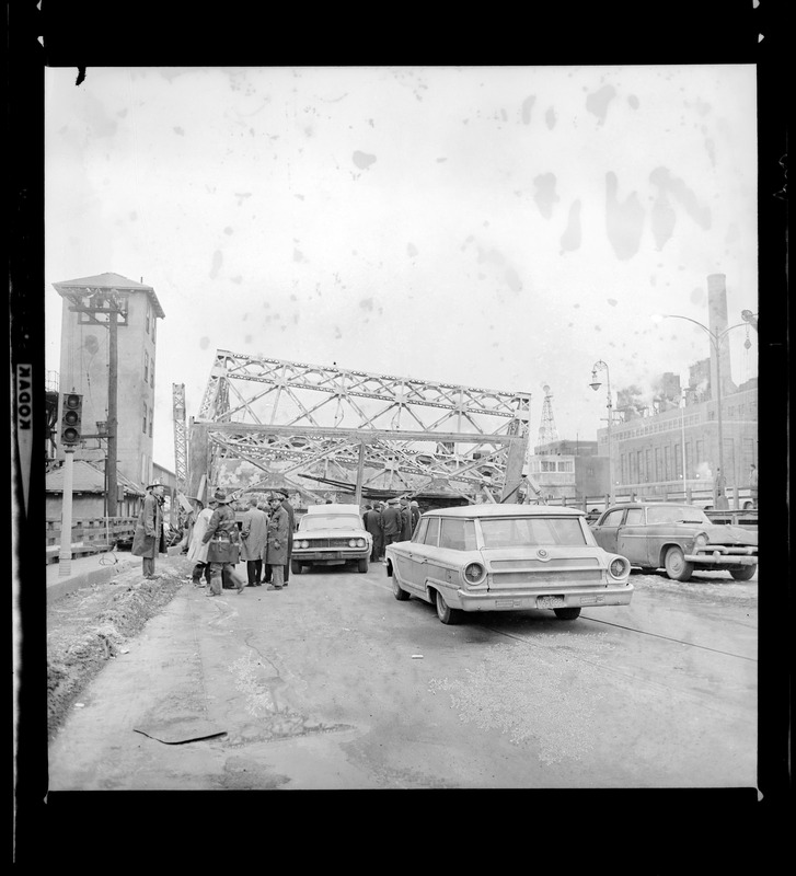 The Old Alford St. bridge linking Charlestown and Everett collapsed with a shattering roar of grinding steel and concrete into the Mystic River yesterday