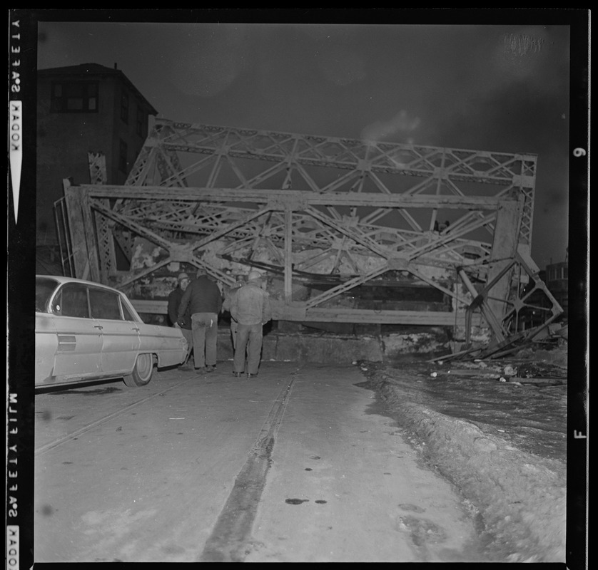 The Old Alford St. bridge linking Charlestown and Everett collapsed with a shattering roar of grinding steel and concrete into the Mystic River yesterday