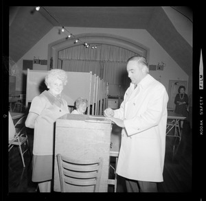 Francis Bellotti and another woman at the polling location