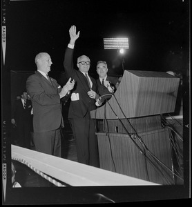 Presidential nominee Sen. Barry Goldwater at the podium waving to the crowd at the Republican rally in Fenway Park