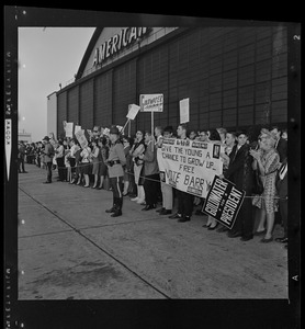 Crowds surrounding and greeting Presidential nominee Sen. Barry Goldwater when he arrives in Boston for a rally at Fenway Park
