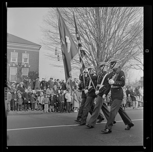 Color guard walking through a parade route