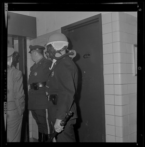 Officer wearing a gas mask