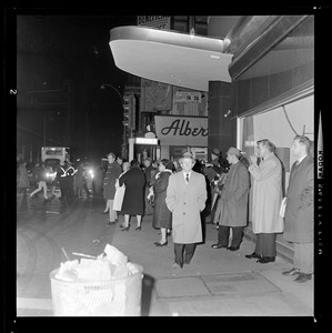 People gathered on the sidewalk near Winter Street during the blackout