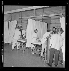 Nurses and doctors tending to patients in hospital ward during the blackout