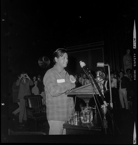 Cesar Chavez addressing the room during the Moratorium Day rally