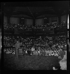 I.F. Stone addressing more than 1000 Harvard students at Sanders Theater last night at the Moratorium Day rally also addressed by John Kenneth Galbraith and Cesar Chavez