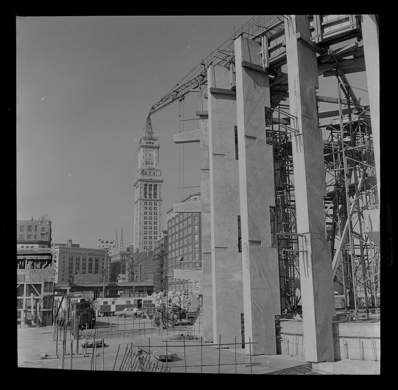 Building of the Boston Aquarium with Boston skyline in the background