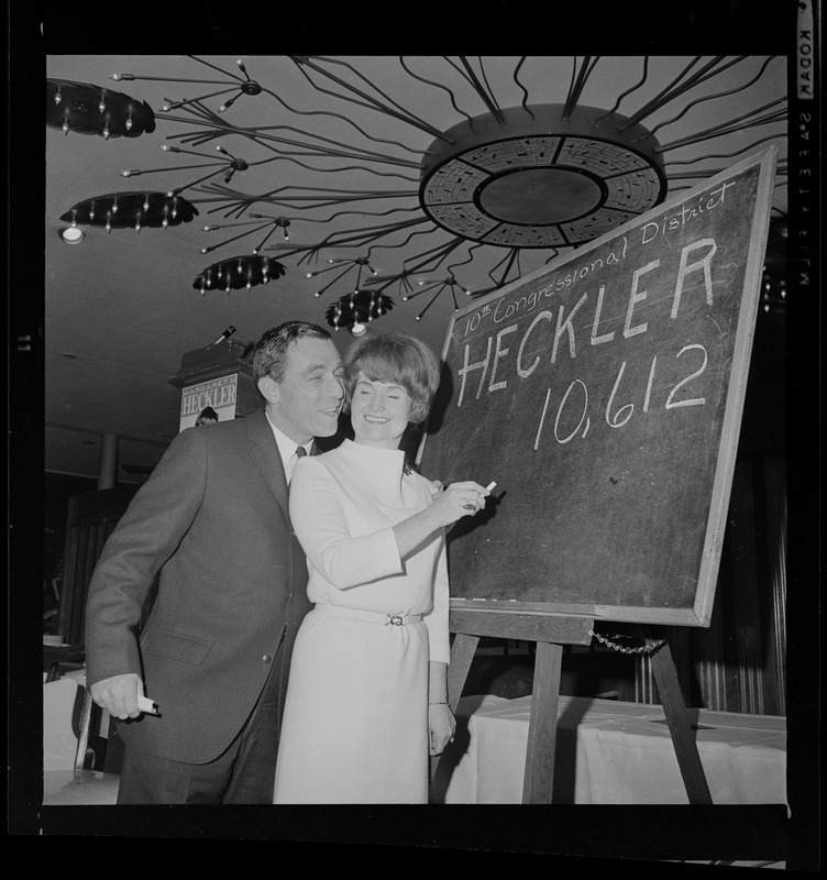 Margaret Heckler and husband John with the votes tally board