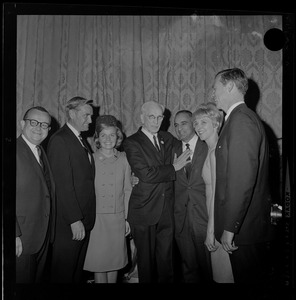 Edward J. McCormack Jr., John McCormack, Frank and Margarita Bellotti and Endicott Peabody, pose with others for the camera