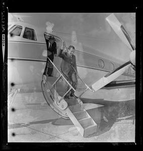 Former Vice President Richard Nixon exiting an airplane