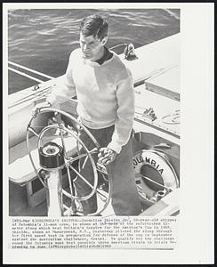 Columbia’s Skipper--Cornelius Shields Jr., 28-year-old skipper of Columbia’s 11-man crew, is shown at the helm of the refurbished 12-meter sloop which beat Britain’s Sceptre for the America’s Cup in 1958. Shields, shown at Mamaroneck, N.Y., yesterday piloted the sloop through her first speed test in preparation for defense of the cup in September against the Australian challenger, Gretel. To qualify for the challenge round the Columbia must beat three American rivals in trials beginning in June.