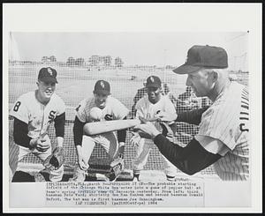 Peppering it Up--The probable starting infield of the Chicago White Sox enter into a game of pepper ball at team's spring training camp in Sarasota yesterday. From left: third baseman Pete Ward; shortstop Ron Han Hansen and second baseman Donald Buford. The bat man is first baseman Joe Cunningham.