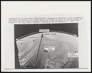 Space Center, Houston: Geographical locations on the continent of Australia are spotted on this photo, taken from Gemini 11 while at a record height of 850 miles above the earth's surface. The object in the foreground is the rendezvous antenna of the Agena target vehicle.