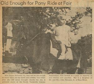 Dorothy Halunen on pony, street fair, South Yarmouth, Mass.