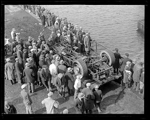 The truck in which two men met their fate when it plunged into the Mystic River at Chelsea Bridge