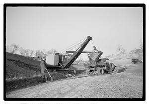 Construction machinery moving earth