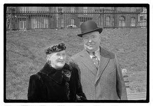 Boston Park Department Commissioner William Long standing with an unidentified woman, Boston Common