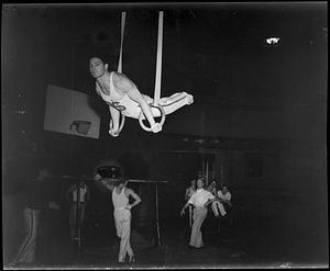 Gymnasts on rings