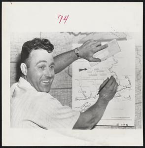 Big Wind Blows Some Good-A smiling Charles F. Nowlin, whose Worcester home was destroyed in last month's tornado holds paycheck which he lost in the storm as he points to tornado area map. The check was found by a sailor near Roxbury. Nowlin is a mail clerk on the Boston - Springfield - New York run of the New Haven Railroad.