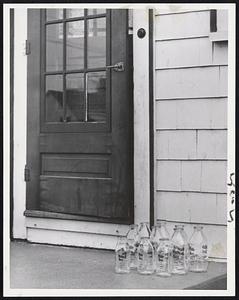 Those Empty Bottles- Throughout Greater Boston milk bottles stood empty at door after door as the strike of 1800 milk truck drivers and processing employes continued into weekend.