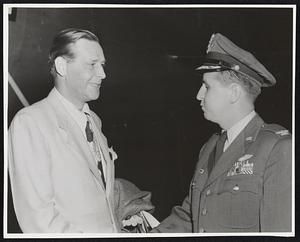 Neubiberg Air Base, Germany. Secretary of Labor, Maurice J. Tobin, is shown being greeted upon his arrival at Neubiberg Air Base, Germany, by Colonel George T. Lee, Deputy Commander, 86th Fighter-Bomber Wing, during the Secretary’s recent tour of US Zone of Germany, Colonel Lee is a resident of 26 Rock Street, Norwood, Massachusetts.