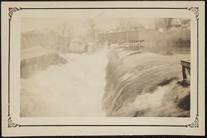 Main Street bridge being swept away