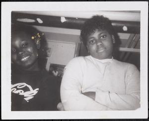 Two young people posing