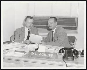 L. to R; George Mingels discussing with Principal Correction Officer Walter D. Achuff at Walpole State Prison the results of his survey
