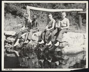 Fishing is a favorite pastime, even for city youngsters.