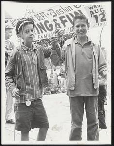 Sharing in the Glory are Mark Harris, 11, and his brother, Daniel, 12, who landed the first fish caught at Jamaica Plain pond today in the 10th annual fishing Rodeo.