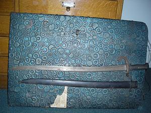 Sword with leather scabbard