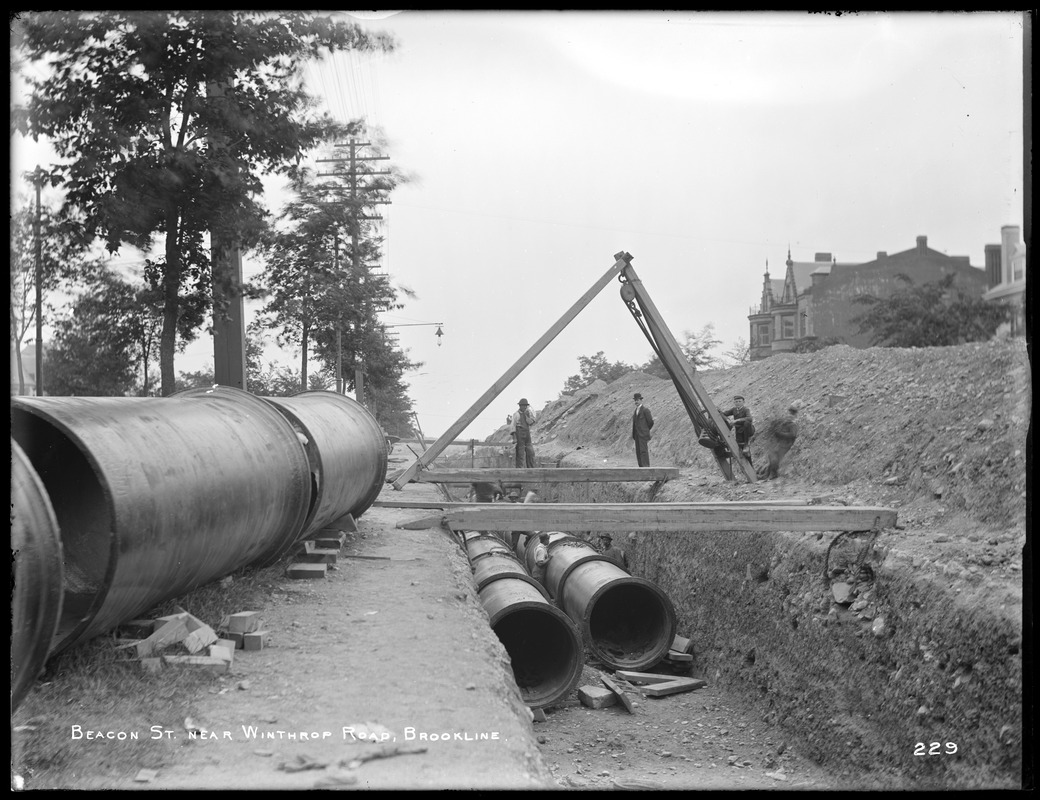 Distribution Department, Low Service Pipe Lines, laying double line of 48-inch pipes on Beacon Street, near Winthrop Road, from the east, Brookline, Mass., Jul. 6, 1896