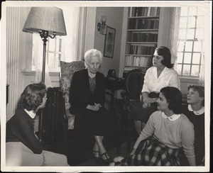Students, French Center, November 1953: Virginia Todd '55, Jacqueline Van Haelst '55, Dorothy Fritz '55, Hilles Hamersley '55, surrounding Miss Helen T. Cooke