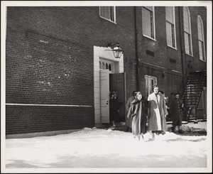 Girls coming out of chapel; winter, 1954-55